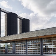 Gesamtanlage in Bern (CH) bestehend aus drei E12-Silos aus Holz mit je 900 m3 Lagervolumen und einer Hopperförderanlage und Vollautomatik-System