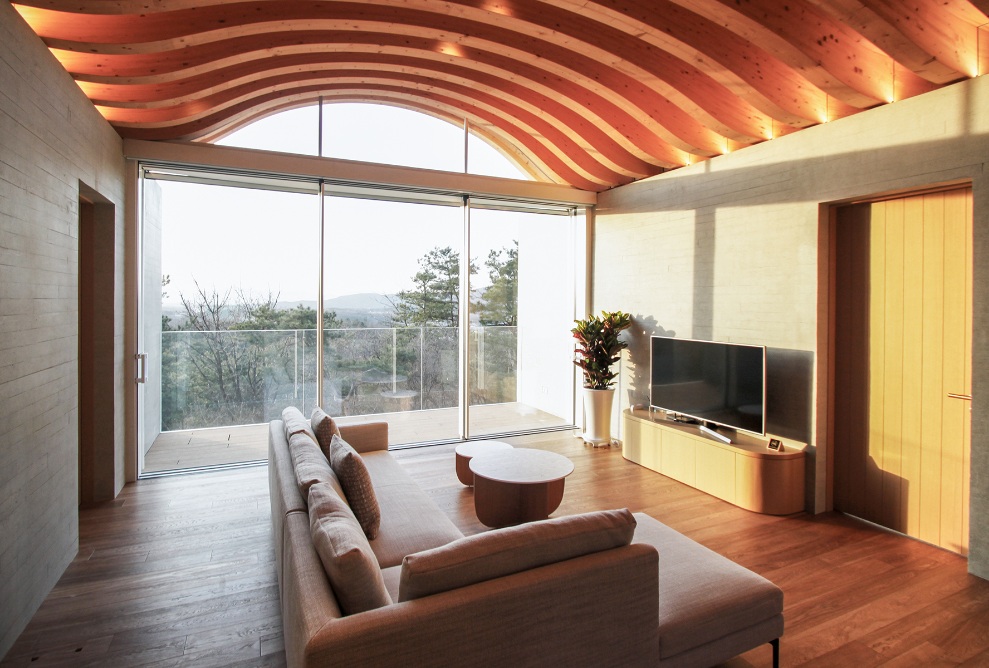Haesley Nine Bridges Golf Club, view inside a suite with sofa in the Timber House, Condo A